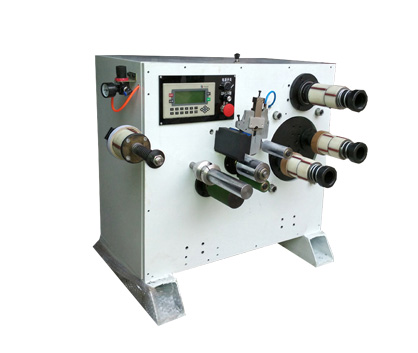 Double shaft small rewinder with half break stripping